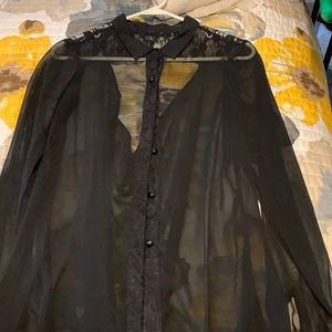 BKE sheer black blouse with longer back and open partial back
